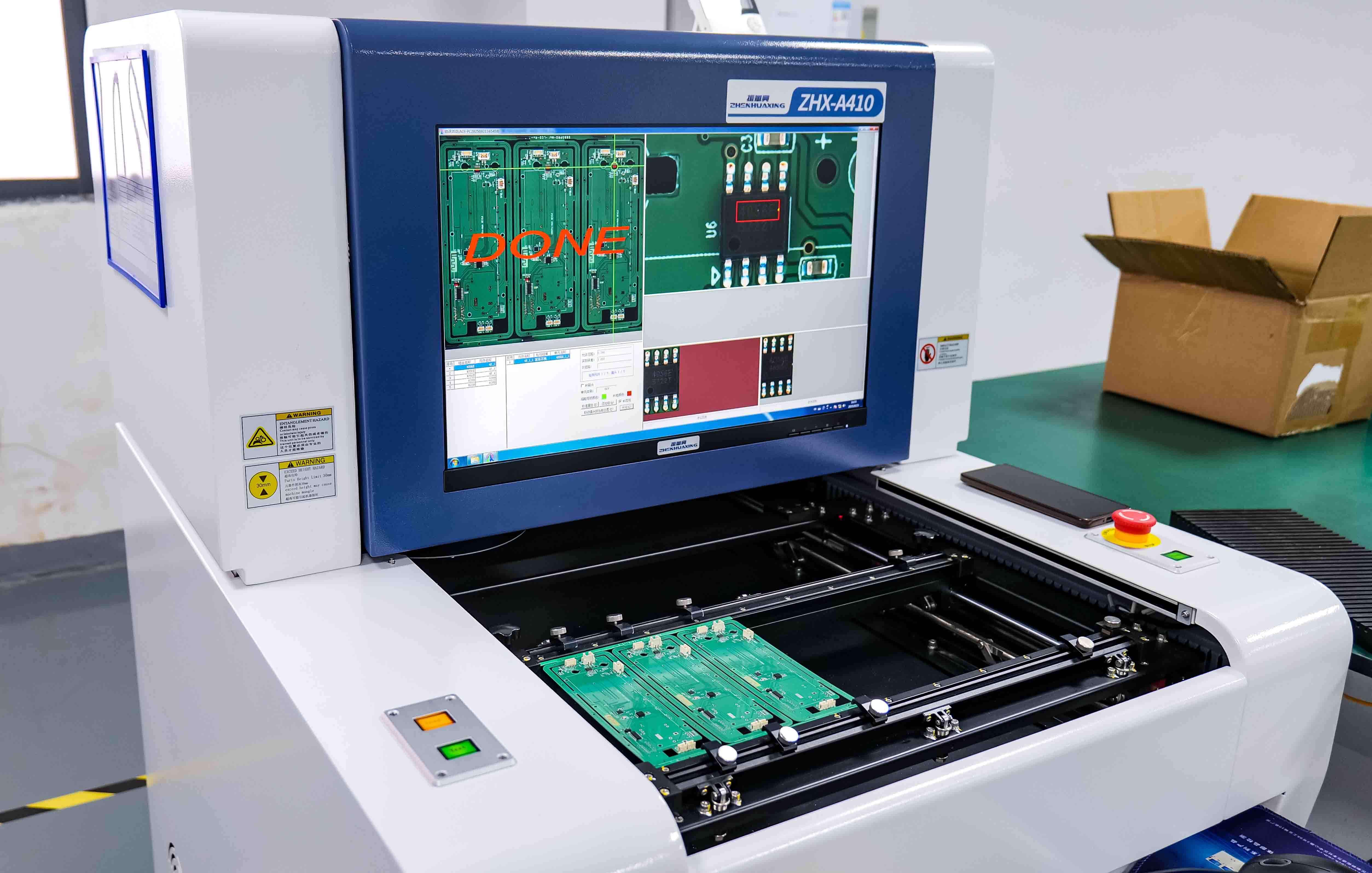 Automated optical inspection station for assembled circuit boards