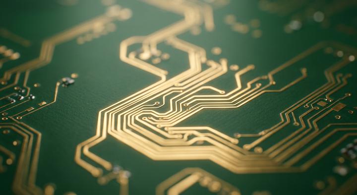 Abstract green and gold circuit board traces representing clean hardware design