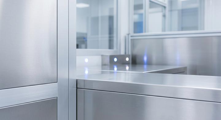 Abstract representation of an automated, clean electronic manufacturing facility with soft glow