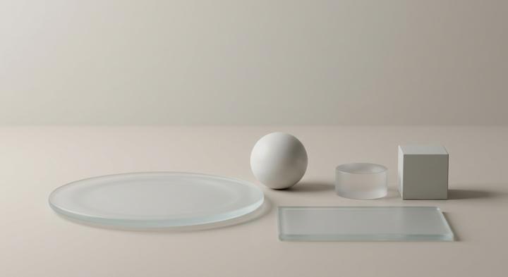 Minimalist abstract 3D shapes depicting frosted glass and acrylic materials