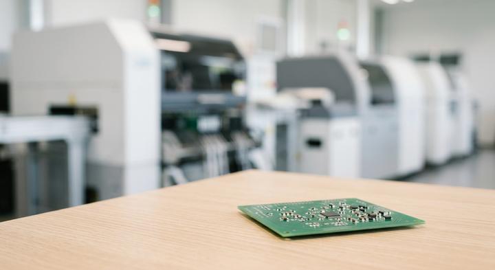 Clean and modern SMT electronics assembly line representing manufacturing precision